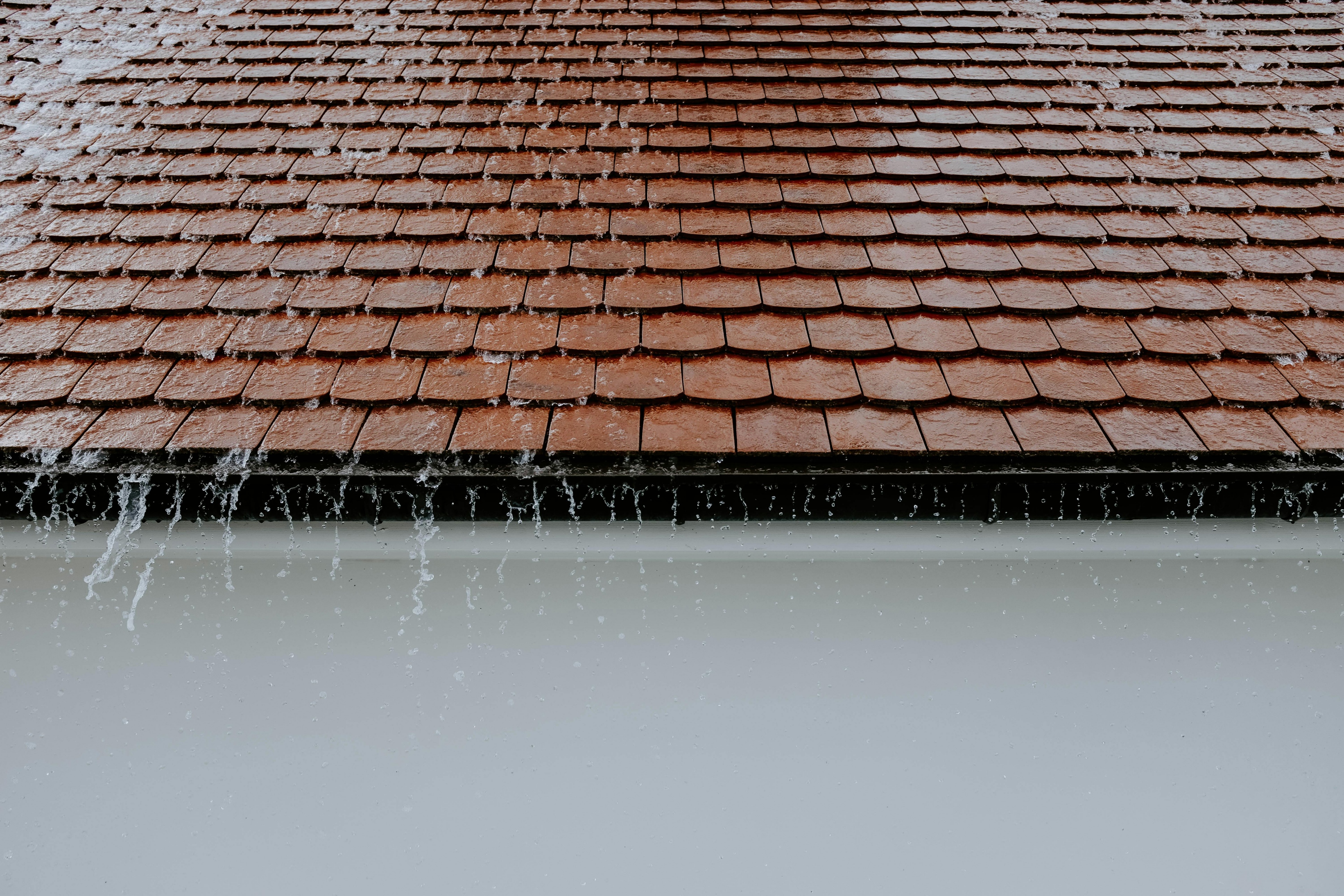 Photo Of Roof While Raining